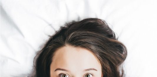 woman under the bedclothes